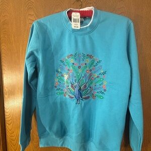 Vibrant Blue Sweatshirt with Peacock Embroidered Art
